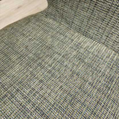 Detail shot of the black metal star base, emphasizing the modern design and swivel mechanism.