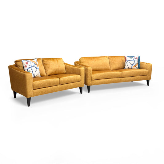 Full frontal view of the 'Oslo' 3-Seater Sofa in Vogue Amber Yellow.