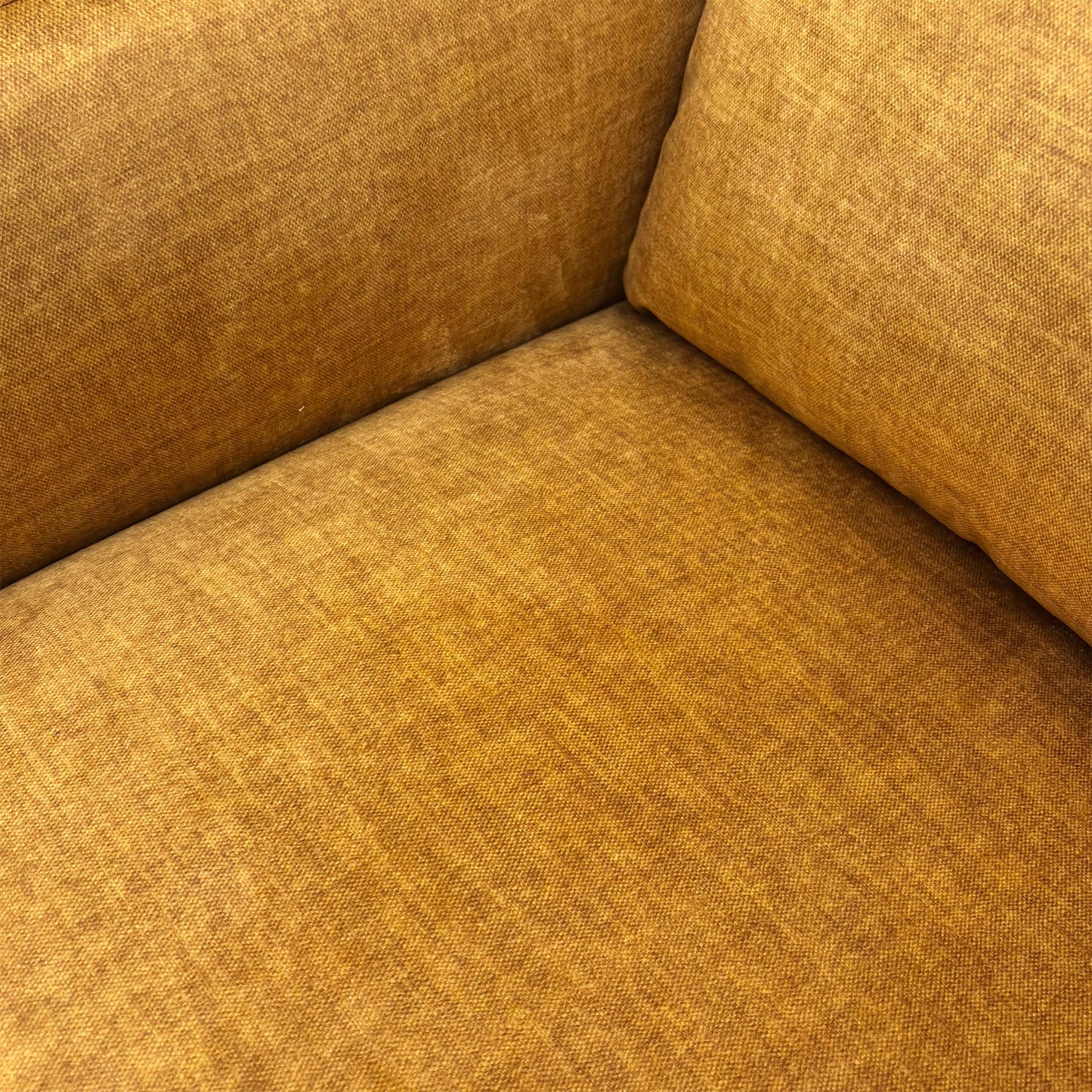 Close-up texture shot of the Vogue Amber Yellow upholstery fabric.