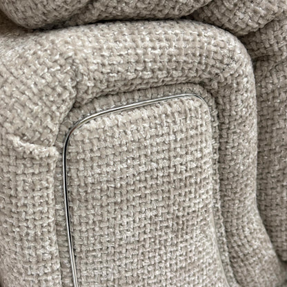 Close-up of the Chunki Pumice Woven Fabric upholstery and stitching detail.