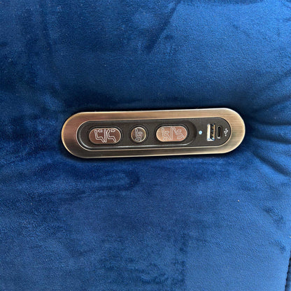 Detail of the discreet power control buttons and built-in USB charging port on the Ezra sofa.