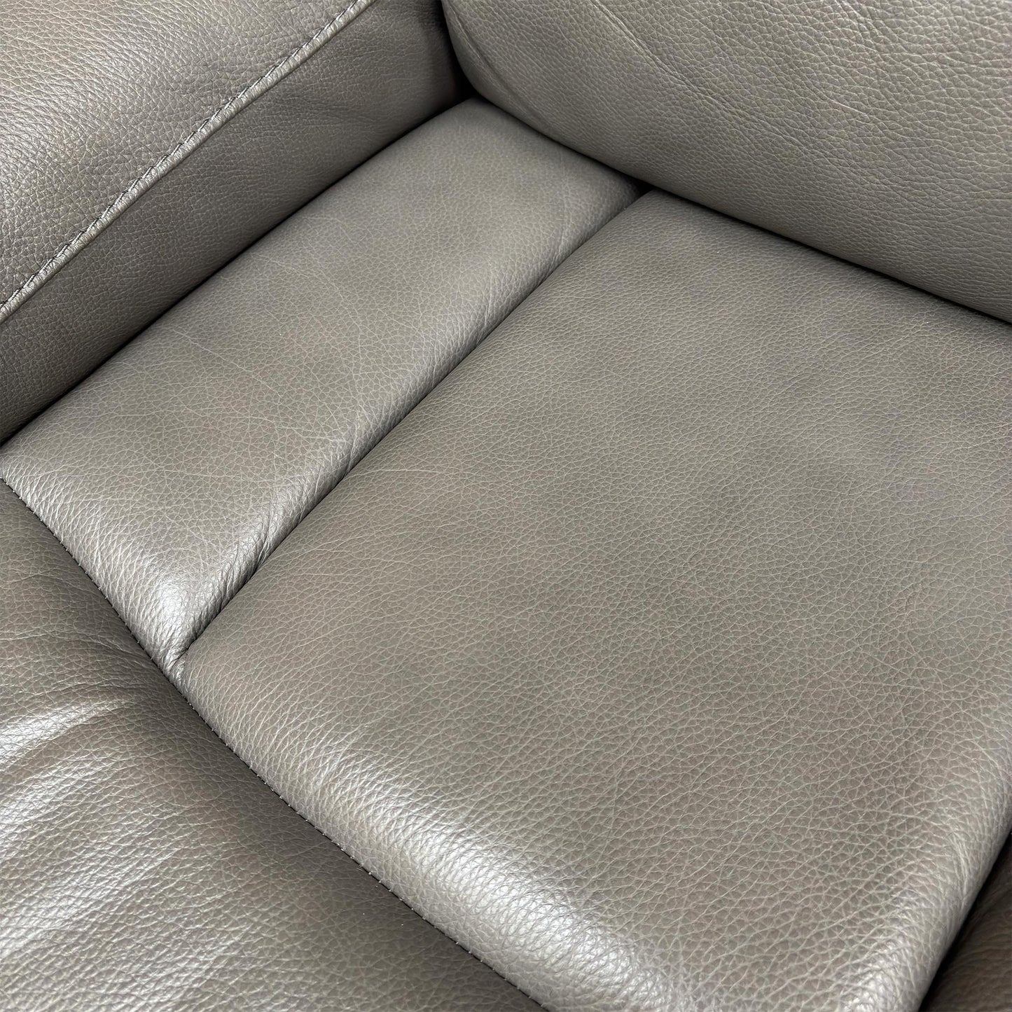 Close-up of the grey leather texture.