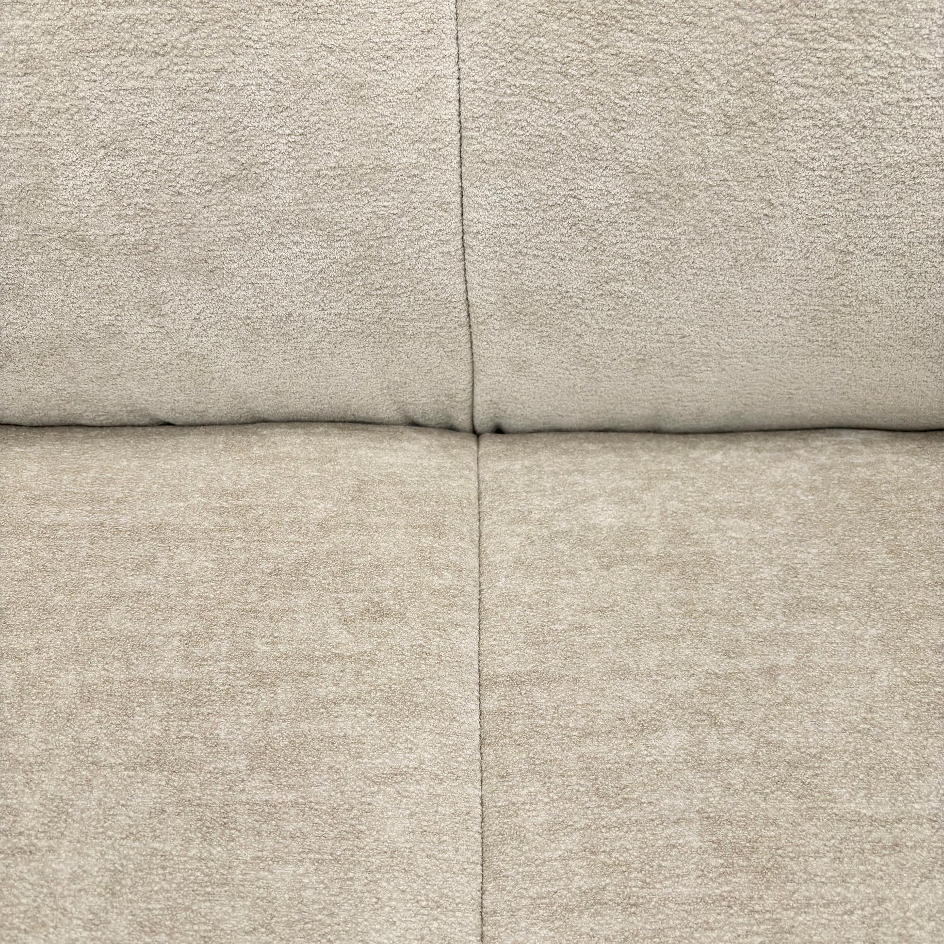 Close-up of the Hudson Mink Velvet texture, highlighting the sophisticated, contemporary button-tufted paneling.
