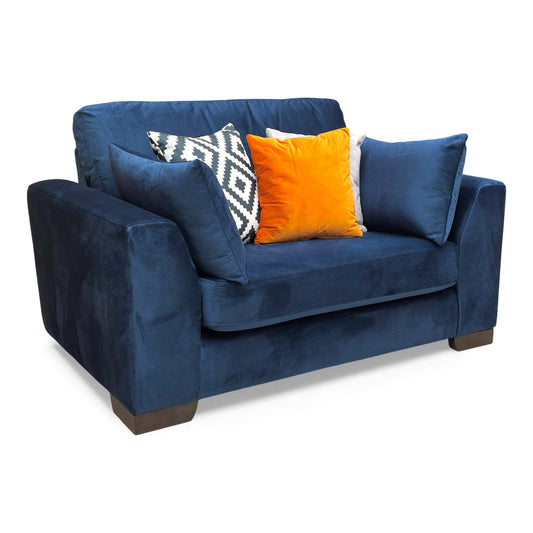 Full view of the love seat in royal navy blue plush velvet.