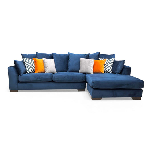 Full frontal view of the large RHF chaise corner sofa in royal navy blue plush velvet.