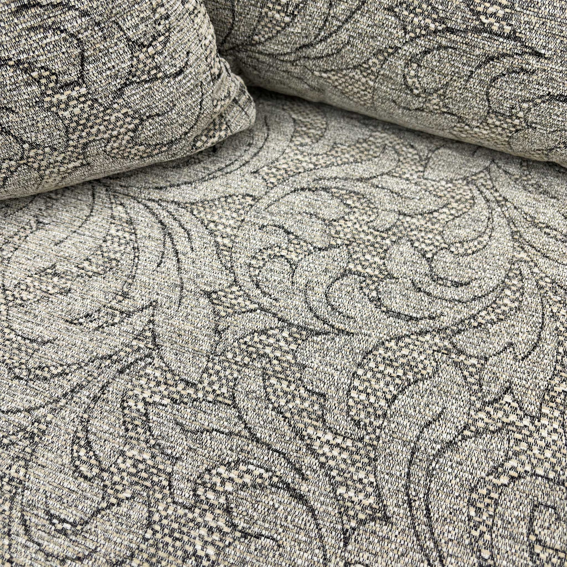 Close-up of the oatmeal patterned woven fabric texture.