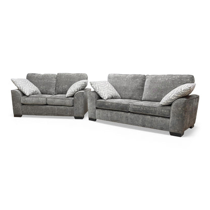 Side view of the 'Theodore' Charcoal Grey Sofa, showing the arm style and profile.