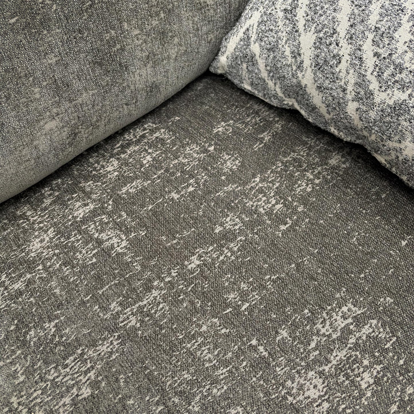 Close-up texture shot of the Charcoal Grey Chenille fabric upholstery.
