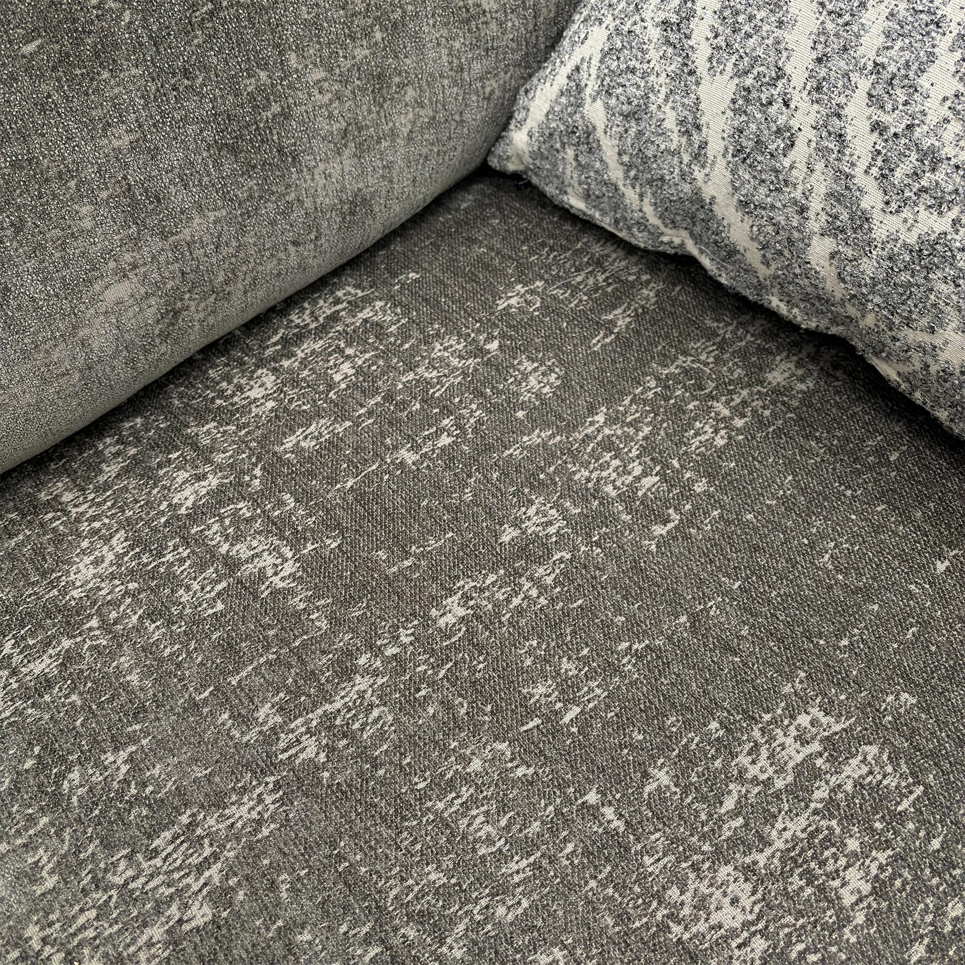 Close-up texture shot of the Charcoal Grey Chenille fabric upholstery.