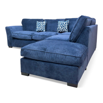 Side view of the ‘Rosie’ Kingston Navy Blue Chaise Corner Sofa, highlighting the sloped arm and modern design.