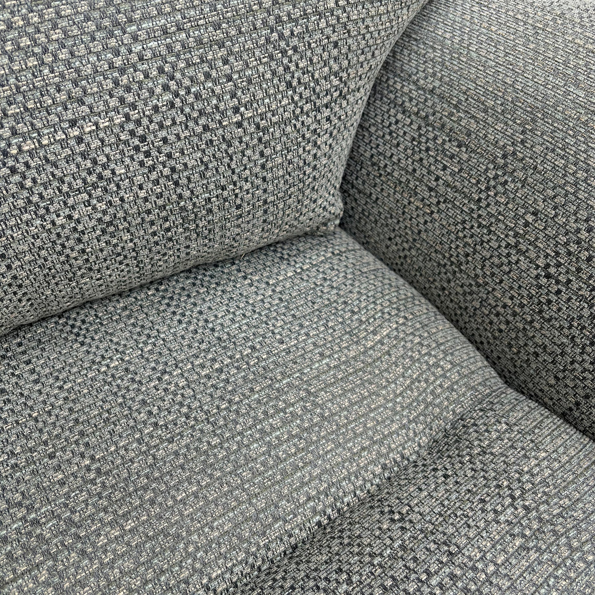 Close-up of the premium duck egg woven fabric upholstery.