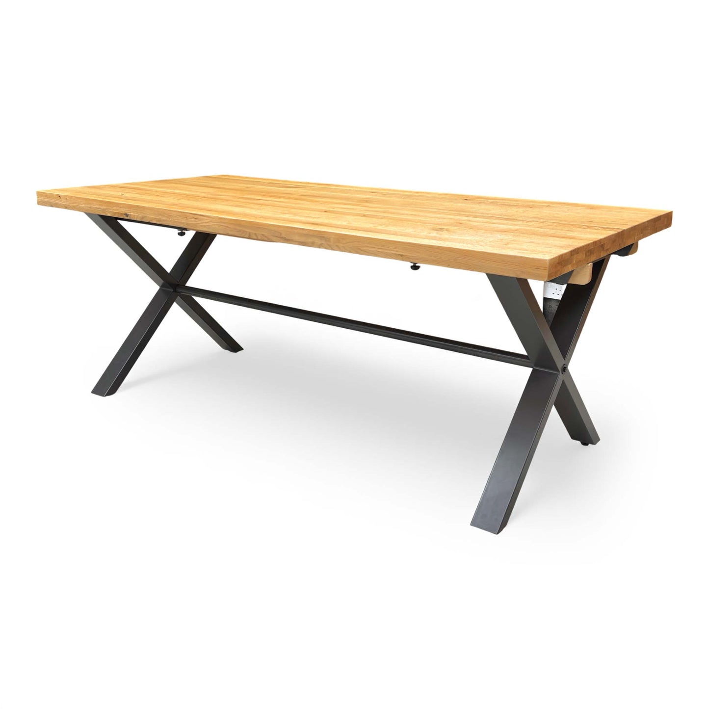 Angled view of the long 'Earth' dining table and its X-shaped metal base.