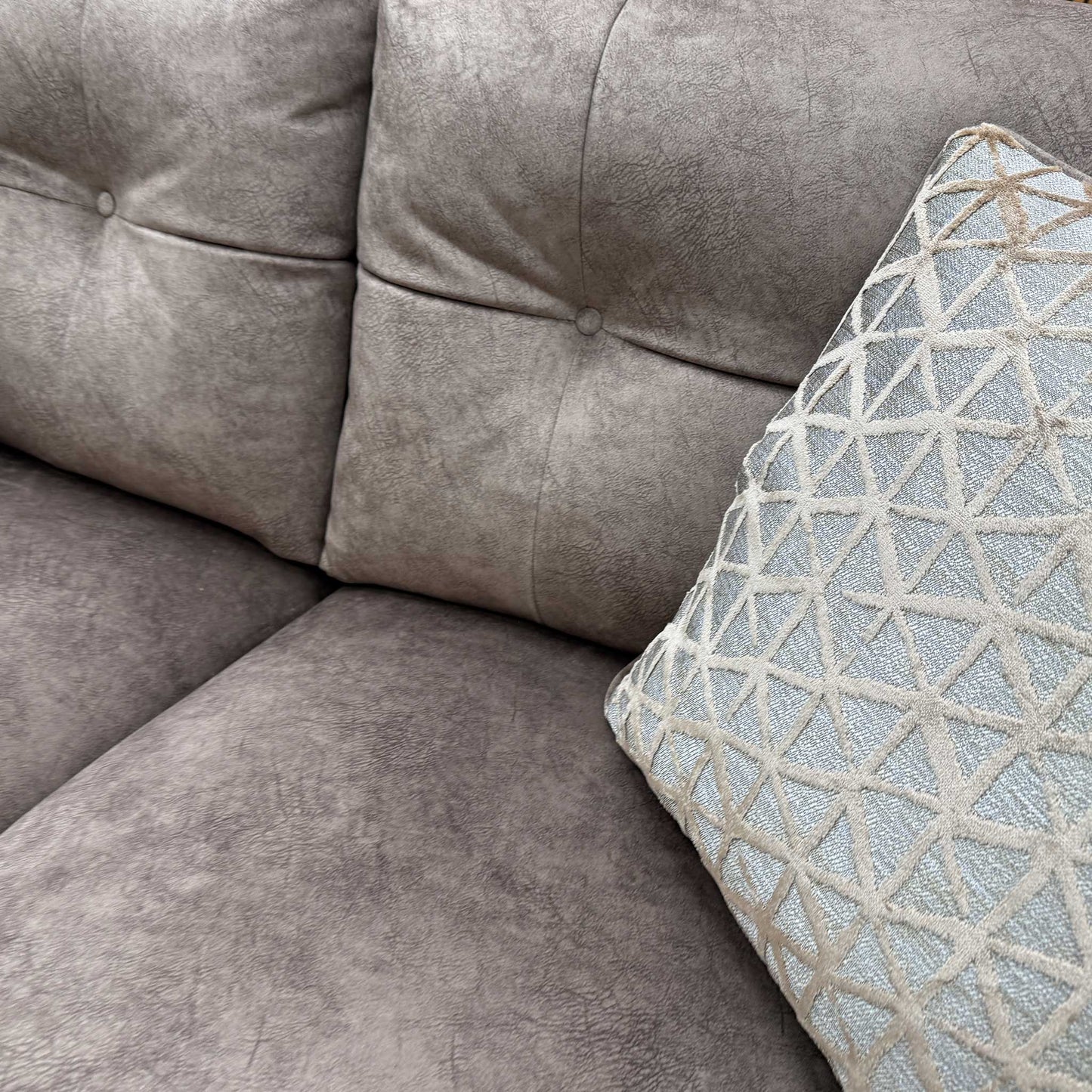 Close-up texture shot of the Dapple Chocolate-Tri Brass Insert Velvet upholstery.