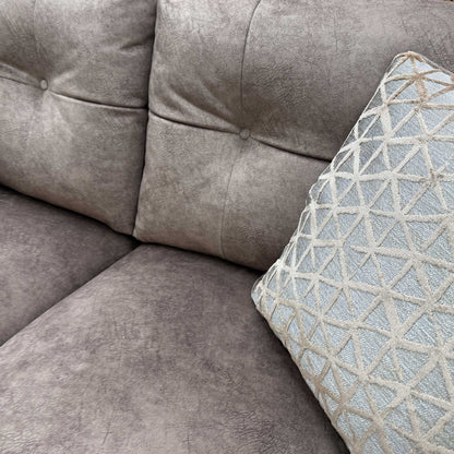 Close-up texture shot of the Dapple Chocolate-Tri Brass Insert Velvet upholstery.