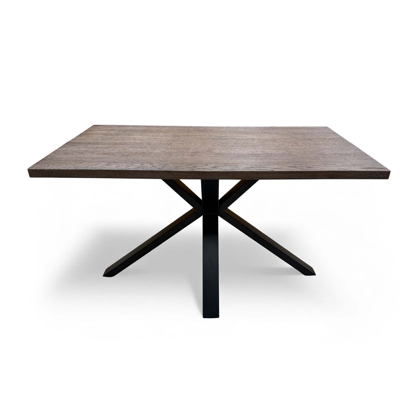 Angled view highlighting the dark oak finish and industrial metal legs of the dining table.