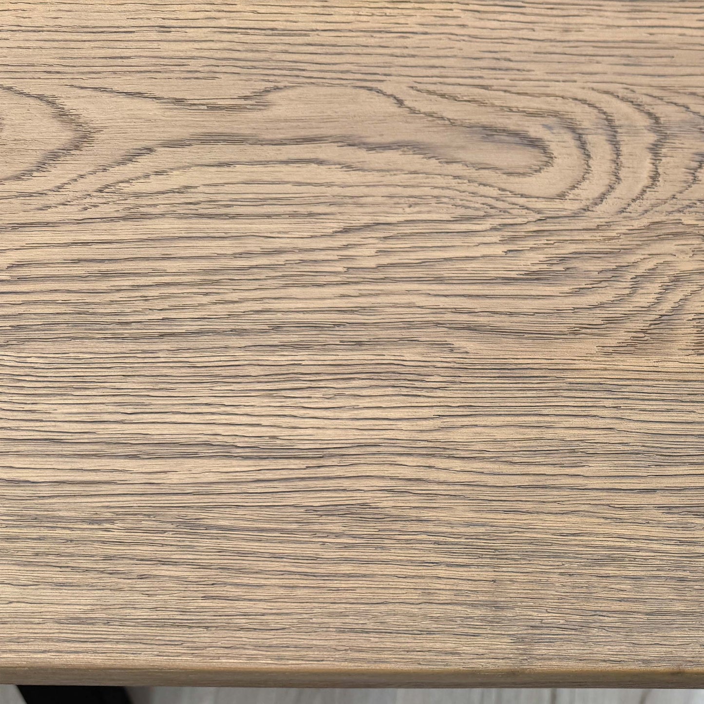 'Saturn' Solid Oak Compact 135cm Fixed Dining Table, three-quarter view on a white background