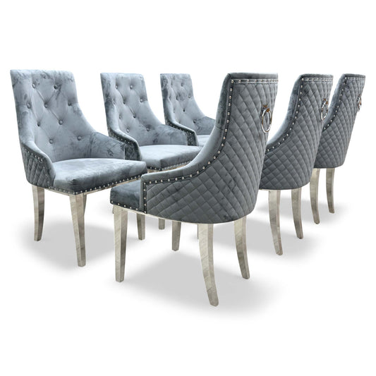 Angled view of the 'Dolce' Grey Velvet Button Back Dining Chair, highlighting the tufting.