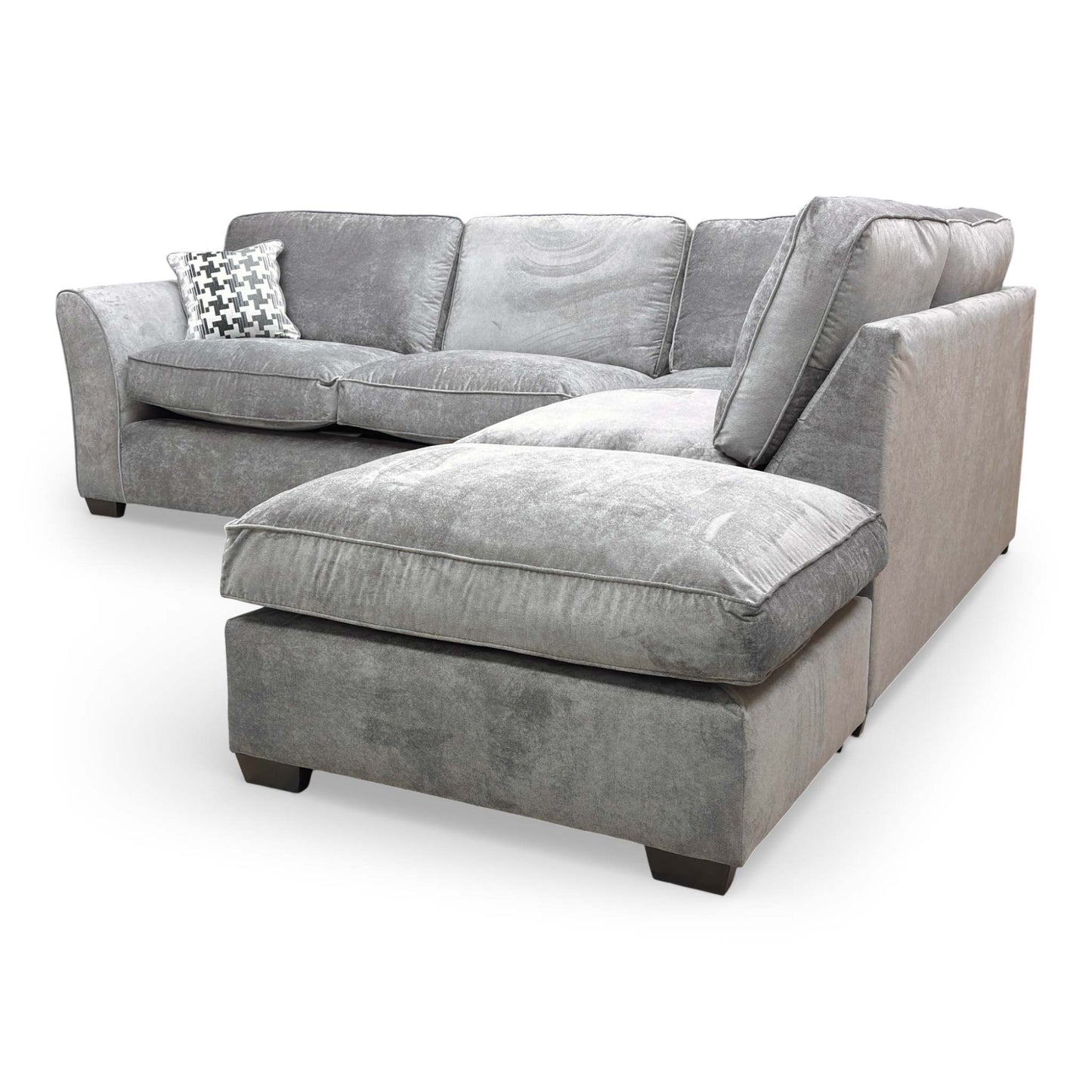 Detailed shot of the sofa corner and chaise section, highlighting the high-quality finish and modern design elements.