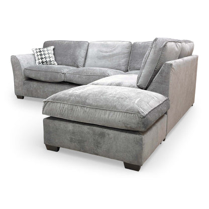 Detailed shot of the sofa corner and chaise section, highlighting the high-quality finish and modern design elements.