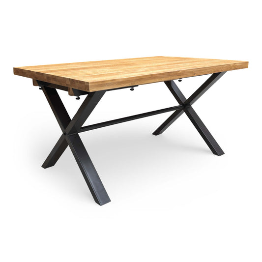 Angle view of the Furniture Village Earth dining table, showing the solid oak top and grey X-shaped metal legs.