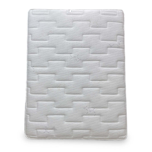 Full view of the Highgrove Plaza king-size mattress, showcasing the quilted white cover and side handles.