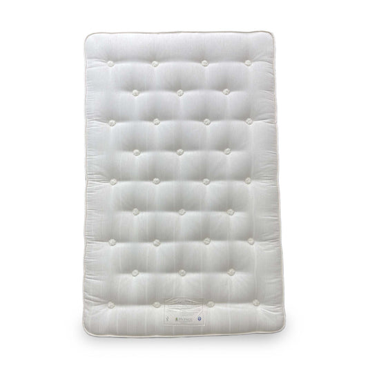 Front perspective view of the Hypnos 'Luxury Firm 2' small double mattress, showing its high-quality tufted surface.