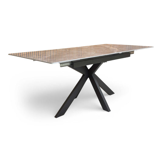 Front view of the 'Kyoto' extending dining table in its 140cm compact form, showcasing the grey marble effect ceramic top.