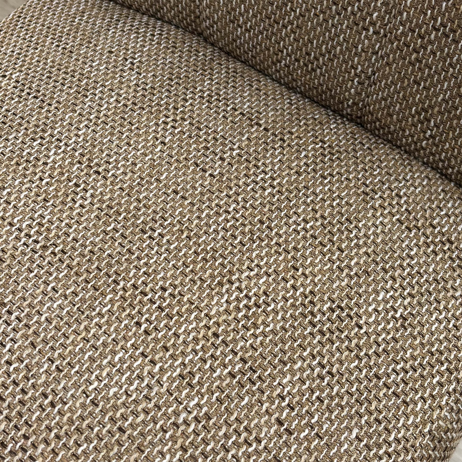 Close-up of the oatmeal waffle tweed fabric, highlighting the textured weave and neutral tones.
