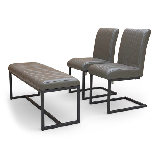 Front view of the 'Arthur' dining set featuring the 120cm grey faux leather bench and two cantilever chairs.