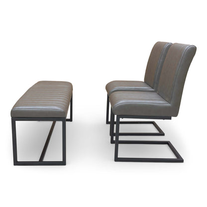 Side view of the dining chair, showing the ergonomic curve of the backrest and faux leather finish.