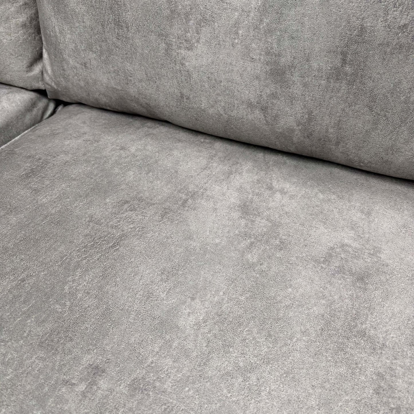 Close-up of the infinity silver velvet fabric, showing its smooth texture and subtle metallic sheen.