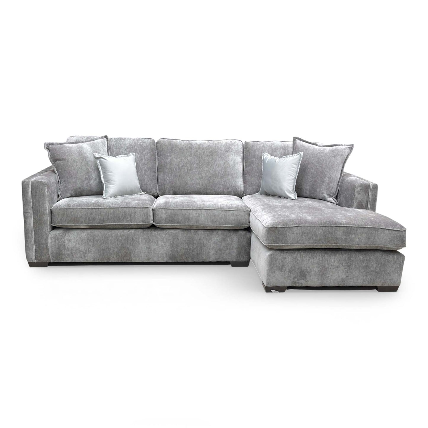 Detailed shot of the open-end chaise section, emphasizing the generous lounging area.