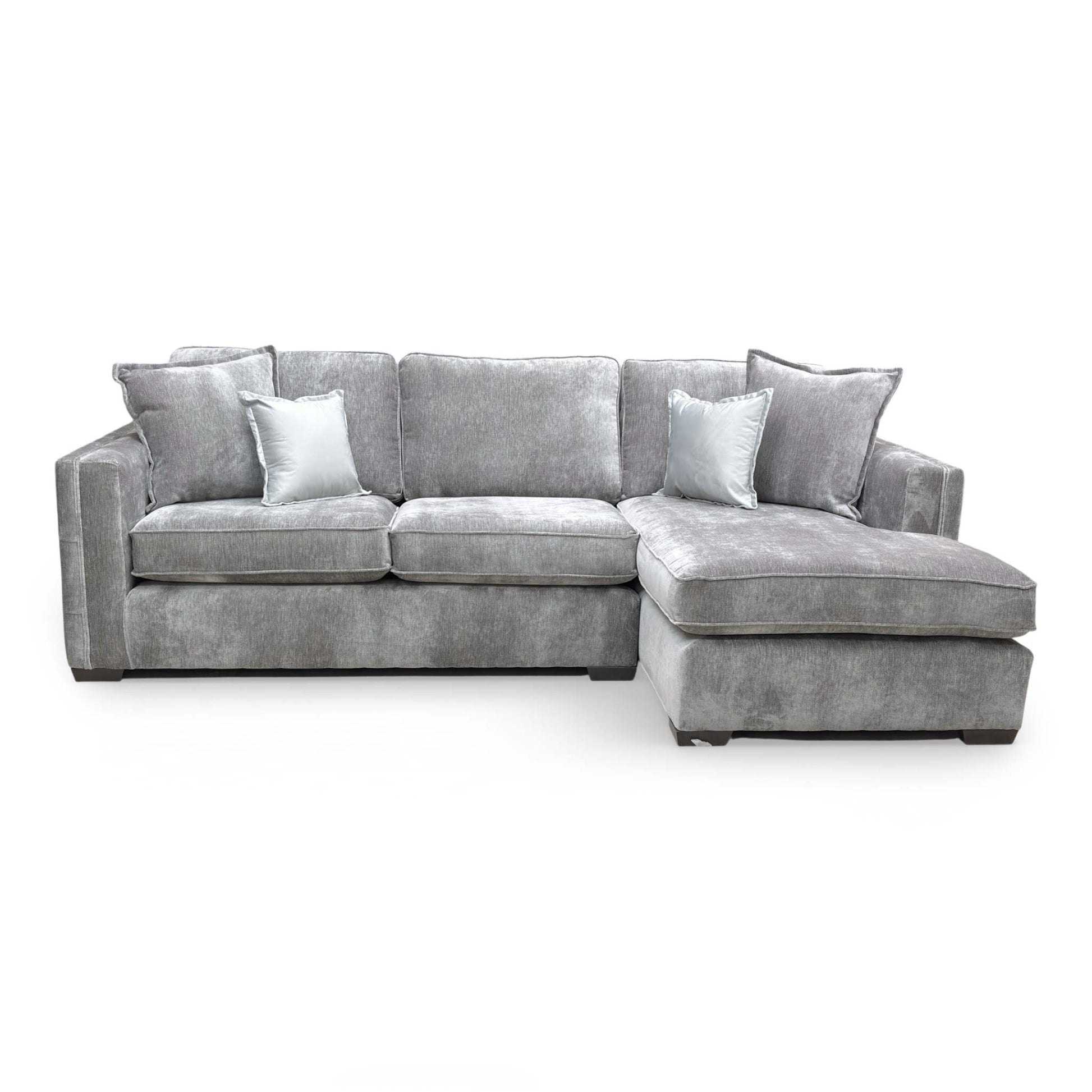 Detailed shot of the open-end chaise section, emphasizing the generous lounging area.