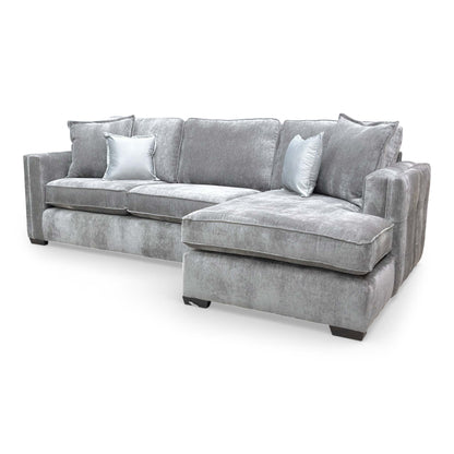 Side view of the corner sofa, showing the sleek profile and contemporary build.