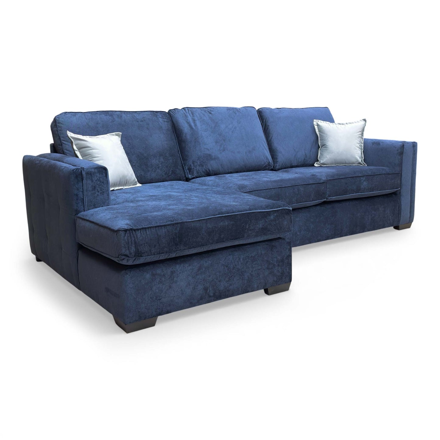 Close-up of the sofa cushions and armrest, showing the contemporary stitching and padding.