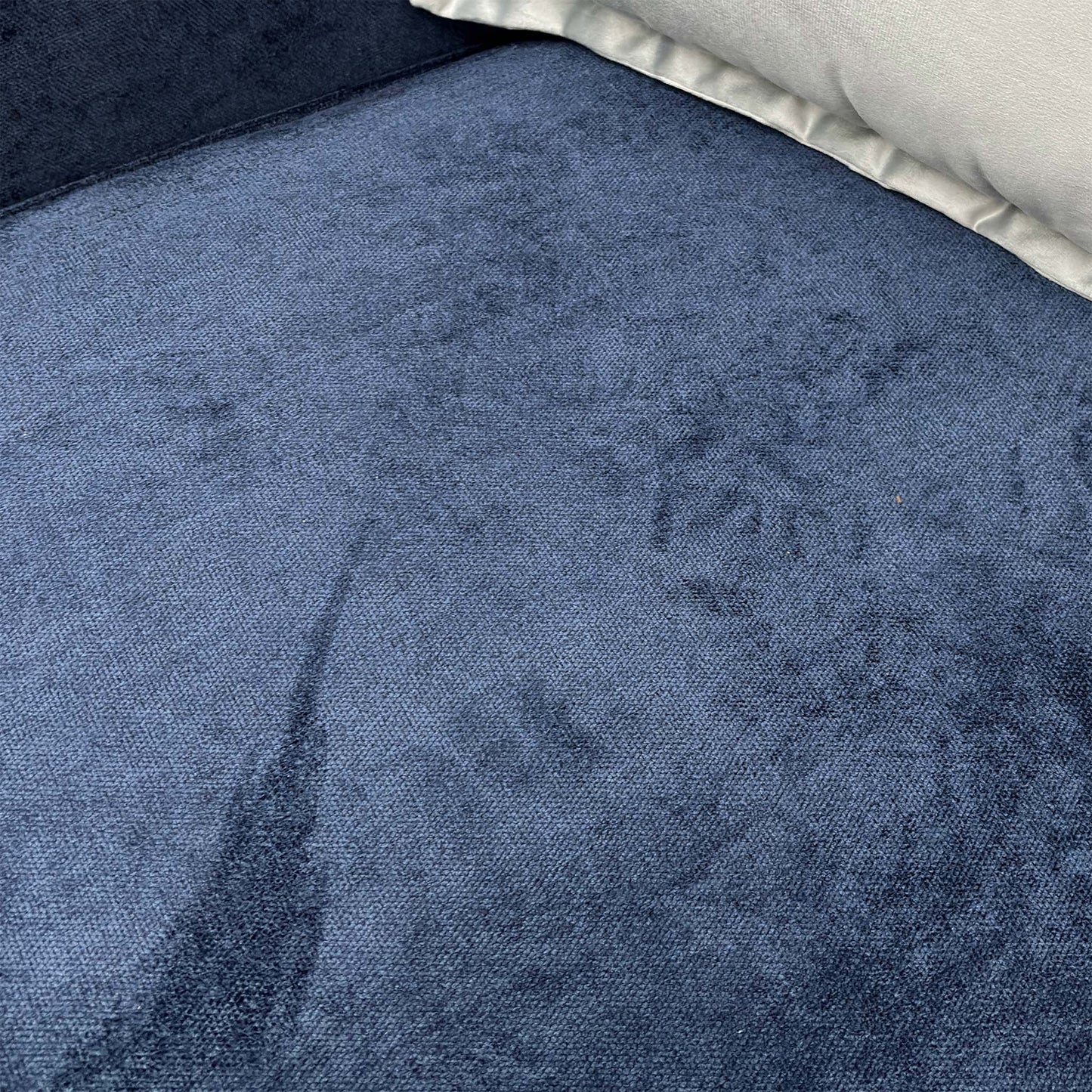 Close-up texture shot of the navy blue Kingston fabric, highlighting the weave and rich color.