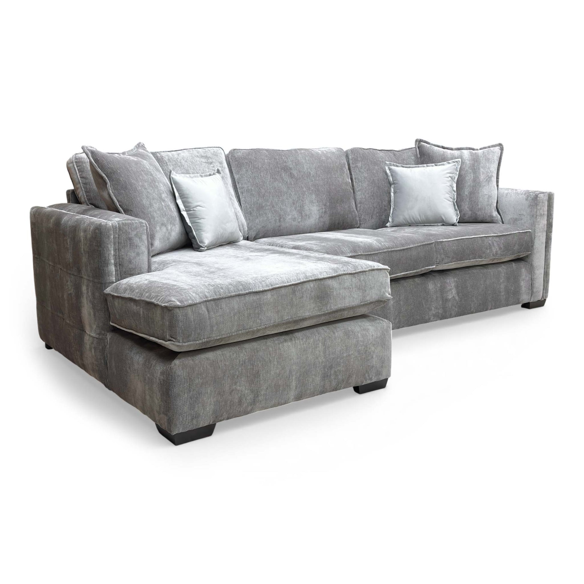 Close-up of the sofa's cushions and English-style armrest, showing the refined stitching.