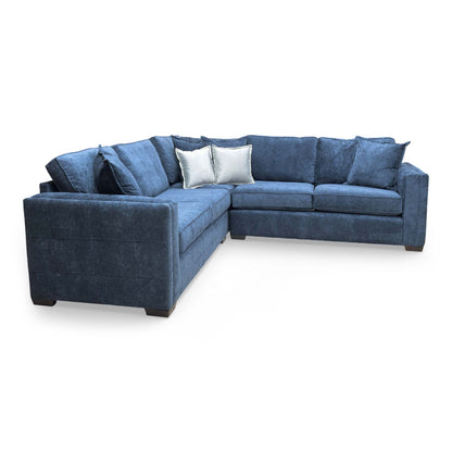 A view of the corner join, showcasing the deep seating area and plush back cushions.