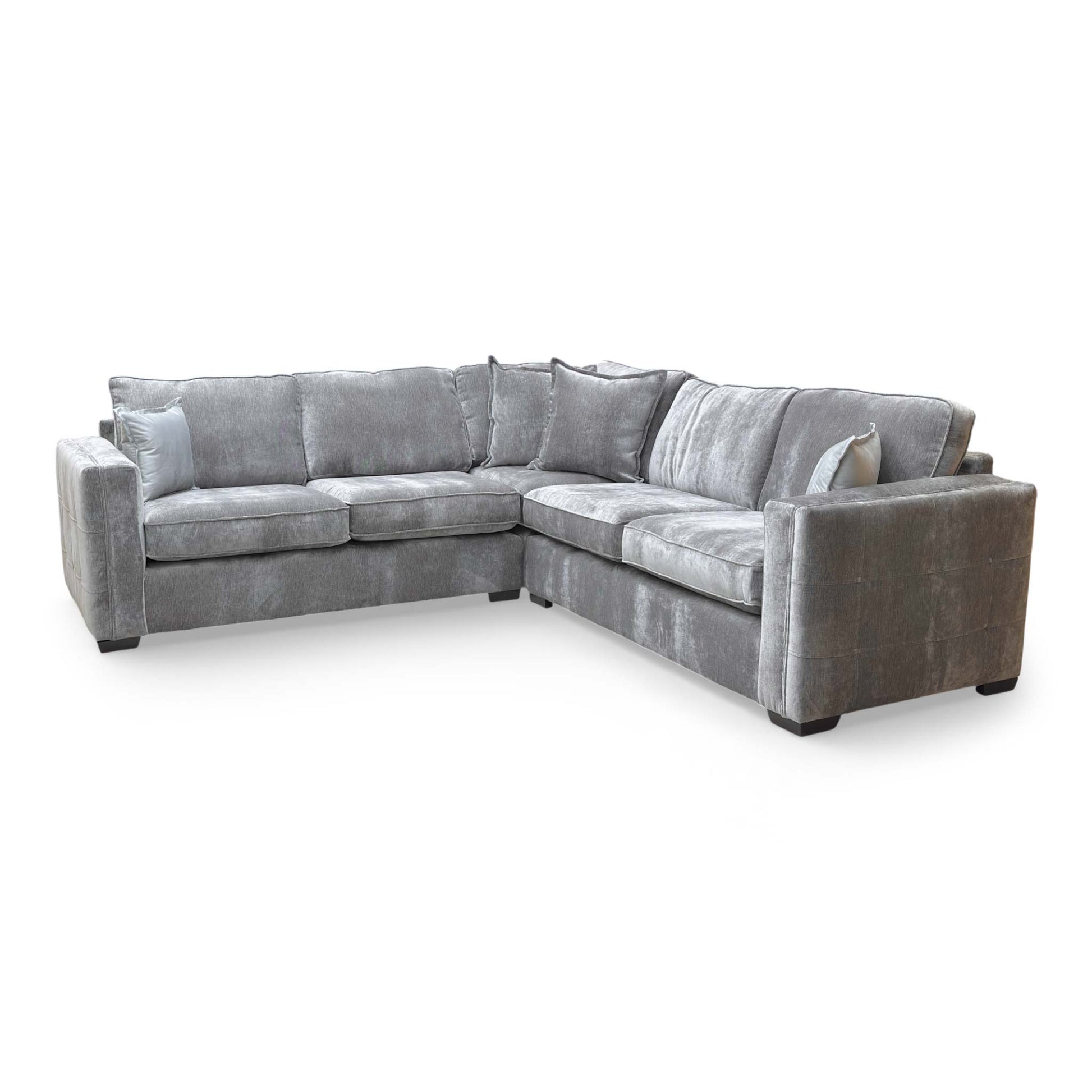 Rear view of the sofa, showing the full-height backrest and the uniform upholstery finish.