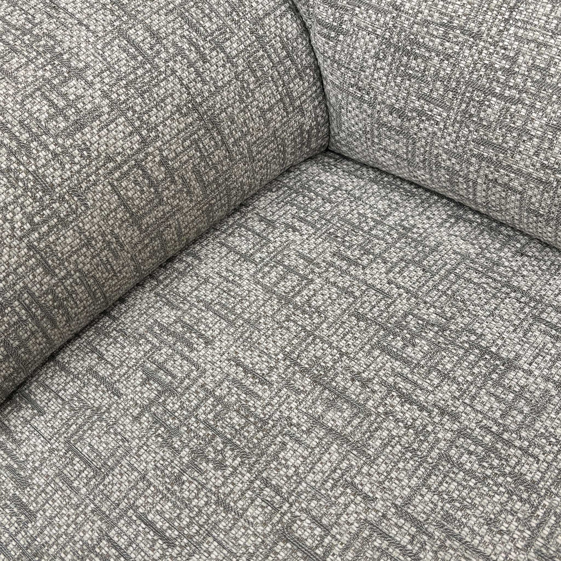 Close-up of the basketweave chenille fabric, highlighting the textured linen weave and neutral color tones.