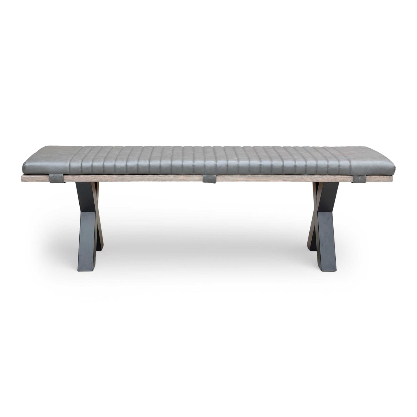 View of the black metal legs from a low angle, emphasizing the industrial design and stability.