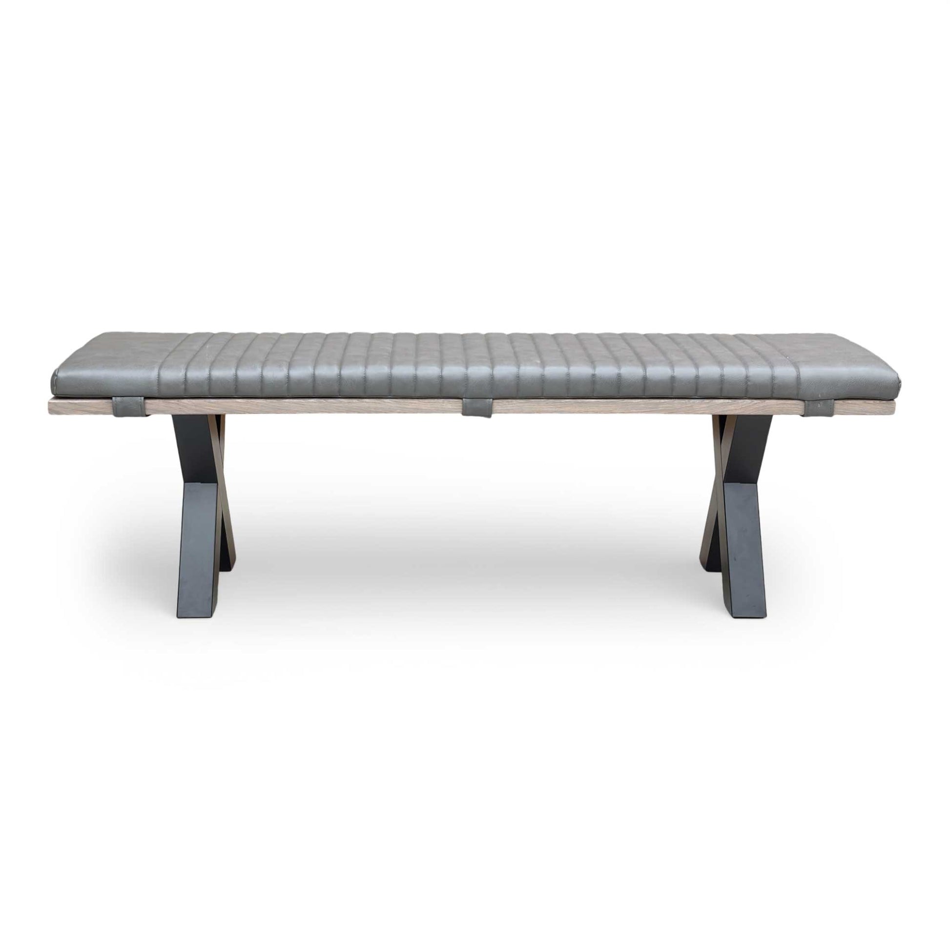 View of the black metal legs from a low angle, emphasizing the industrial design and stability.