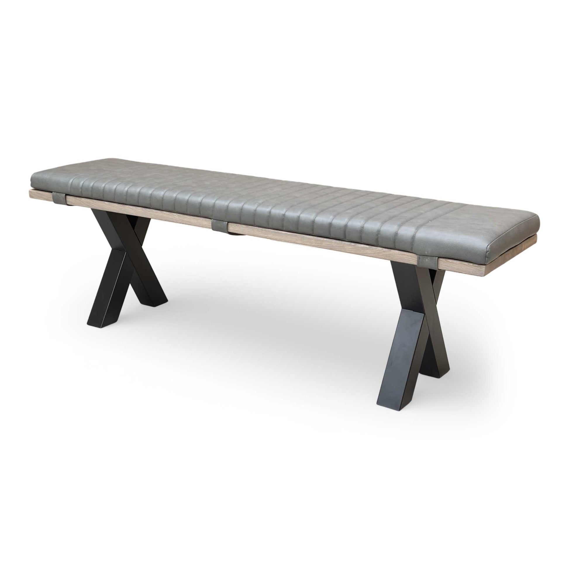 Side view of the bench, highlighting the black metal X-shaped legs and the thickness of the oak top.