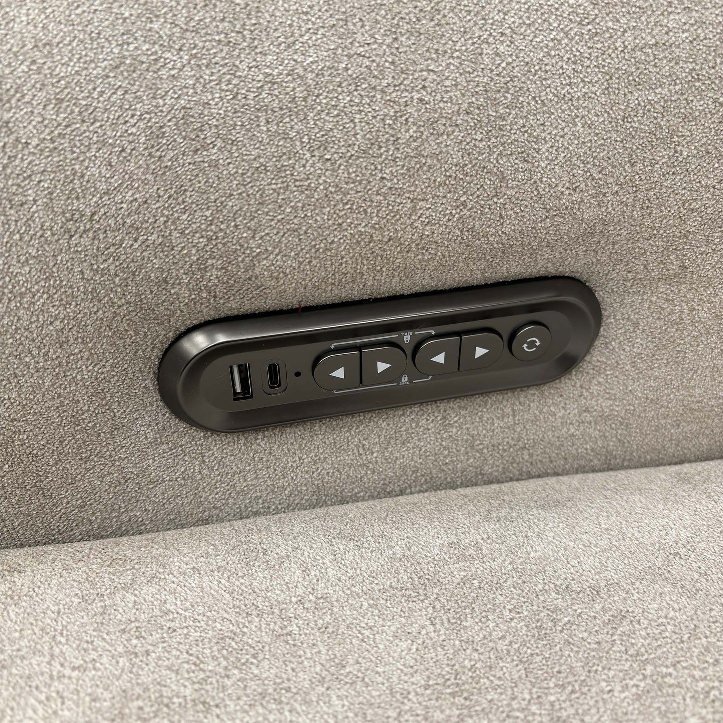 Detail view of the integrated power controls, featuring USB and USB-C charging ports for mobile devices.