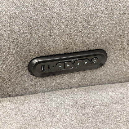 Detail view of the integrated power controls, featuring USB and USB-C charging ports for mobile devices.