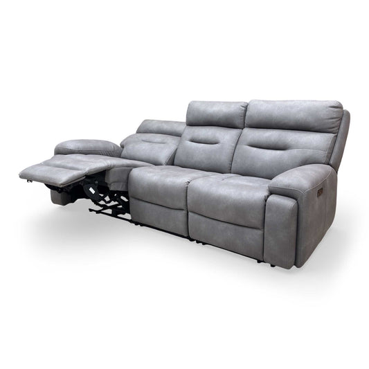 Side profile of the sofa, illustrating the ergonomic back support and recliner clearance.