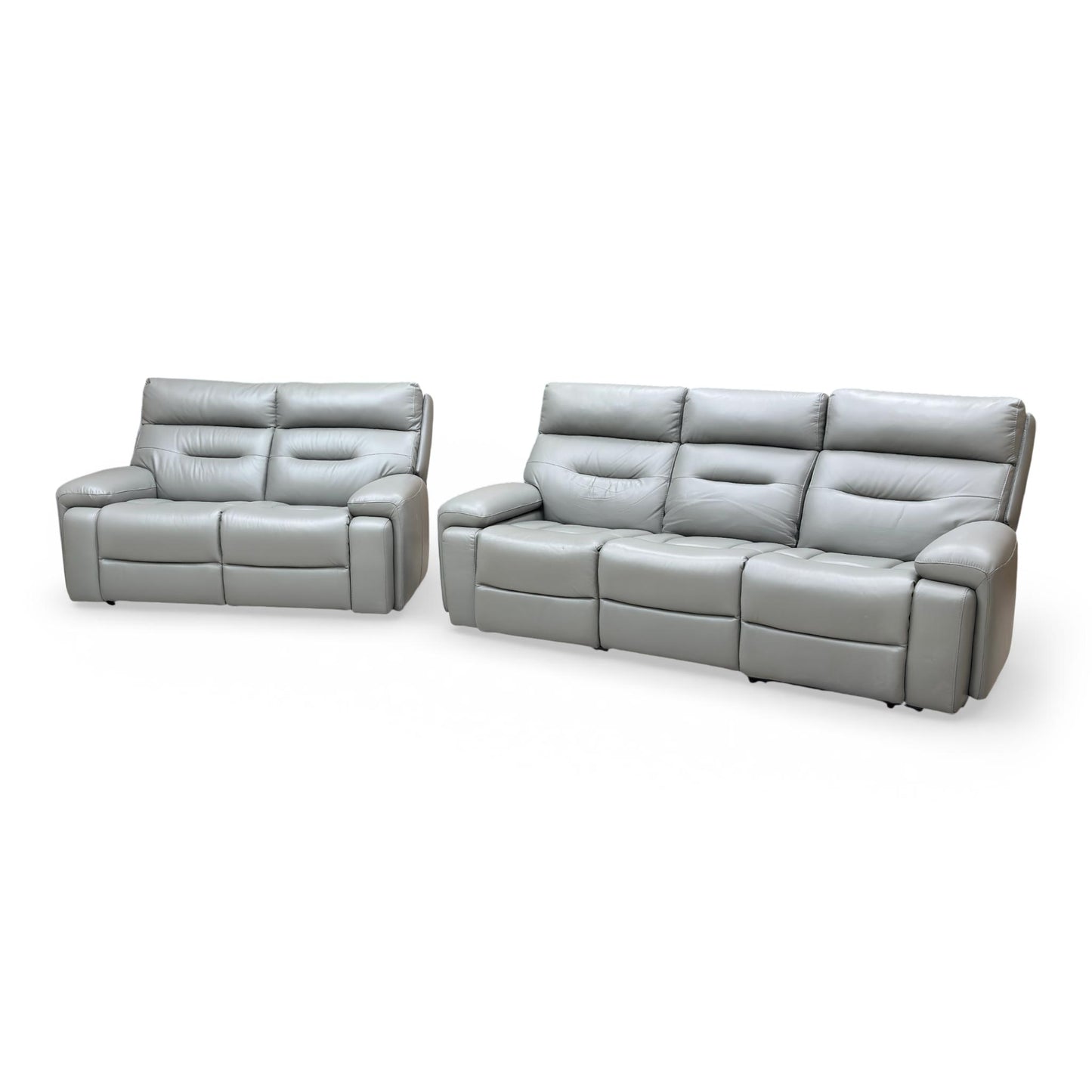 Angle shot of the micro-adjustable power headrests, demonstrating the ergonomic support options.