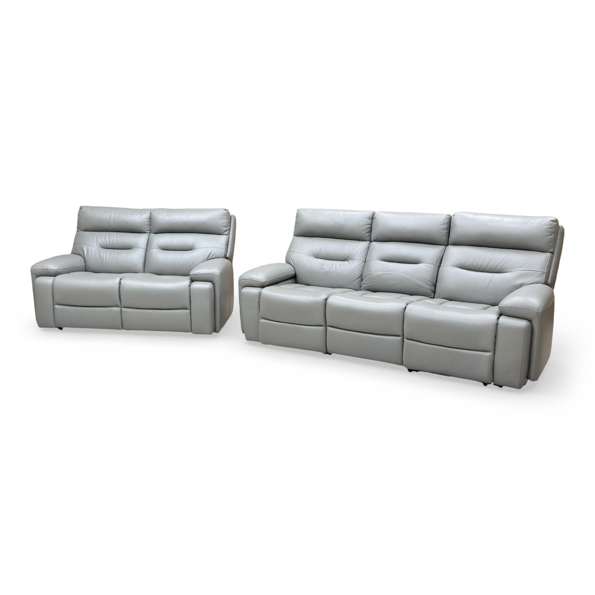 Angle shot of the micro-adjustable power headrests, demonstrating the ergonomic support options.