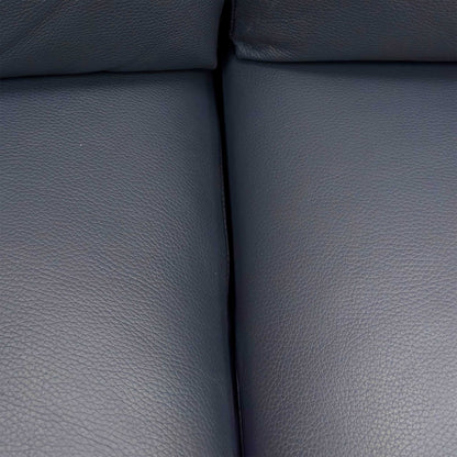 Close-up of the stitching details and the medium-firm foam seat cushions.