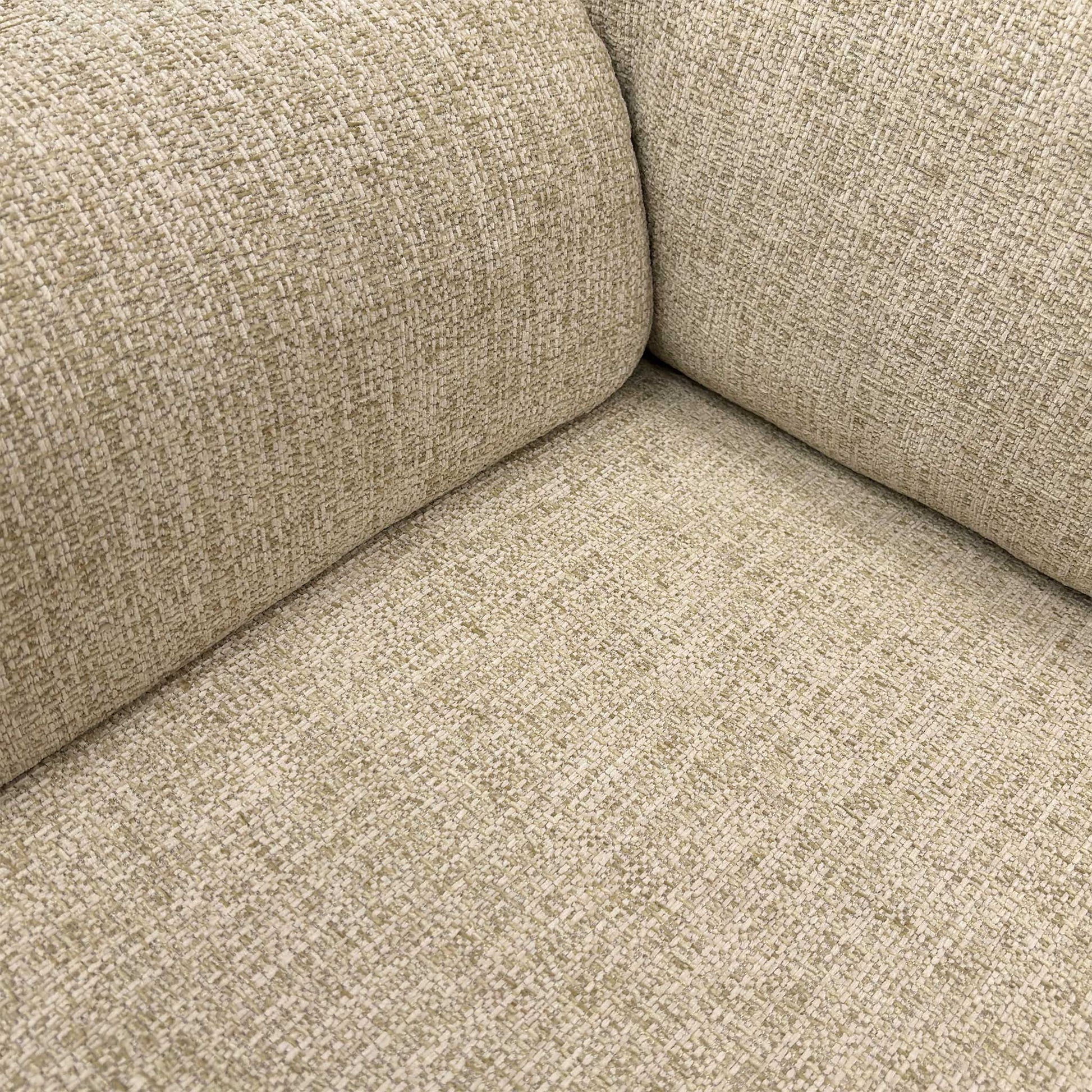Close-up of the Rush Sand (C932) fabric weave, showing the soft neutral tones and durable texture.